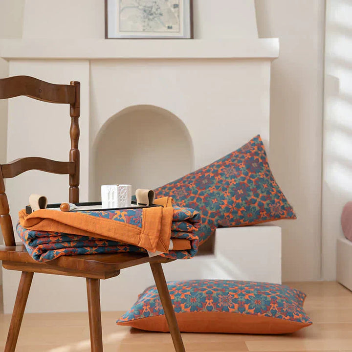 Warm and inviting orange & blue six-layer organic cotton quilt, comfortable bedding for your home.