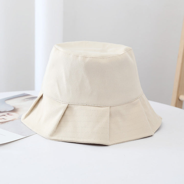 Khaki Orion bucket hat, a trendy and lightweight sun hat for beach and outdoor activities.