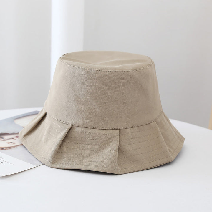 Close-up of a blue unisex bucket hat, showcasing the cotton blend and casual style.