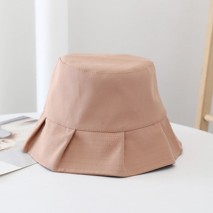 Orion bucket hat in white, offering excellent sun protection for summer and travel