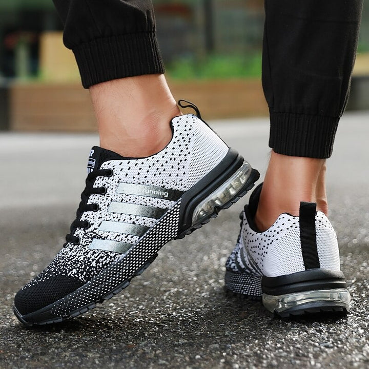 Unisex athletic shoes, lightweight and orthopedic with advanced air cushioning for active support.