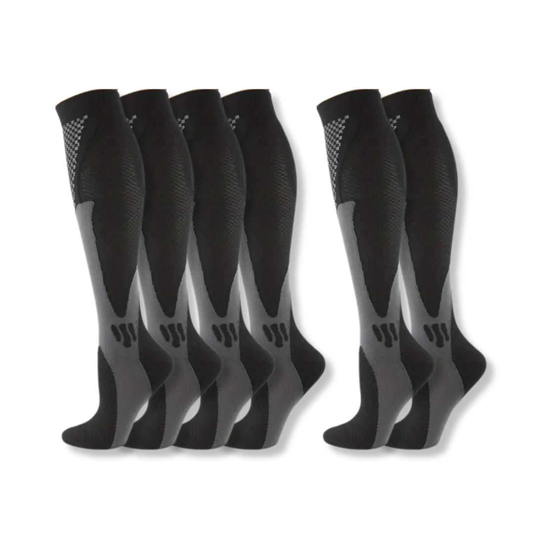 Graduated compression socks providing targeted relief for leg pain, swelling & fatigue reduction.