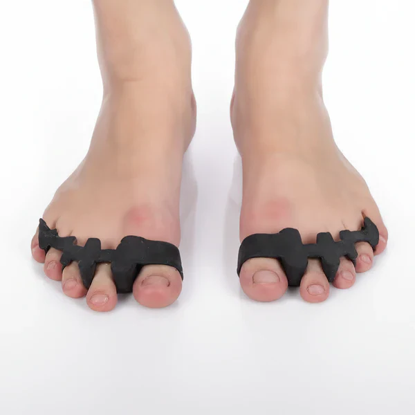 Unisex orthopedic gel toe separators for bunion & hammer toe relief, promoting foot alignment & pain relief.