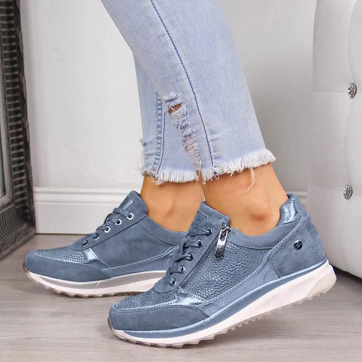 Person wearing unisex orthopedic leisure shoes, perfect for casual walking & all-day comfort.