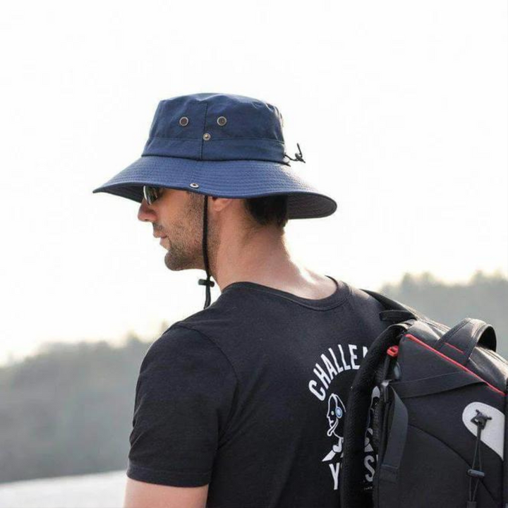 Outdoor sun protection bucket hat for men & women, essential adventure gear.