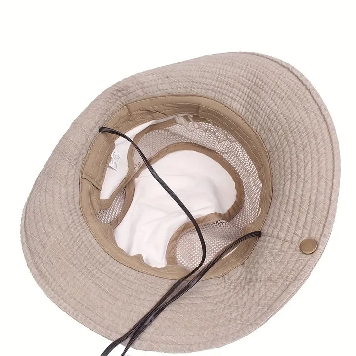 Versatile unisex travel sun hat with extra wide brim and adjustable fit, offering superior sun protection.