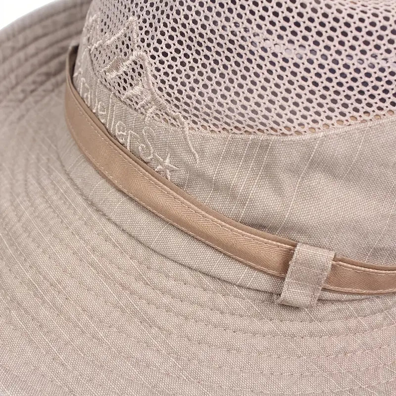 Unisex outdoor sun hat with breathable fabric, wide brim, and adjustable strap for comfortable all-day wear.