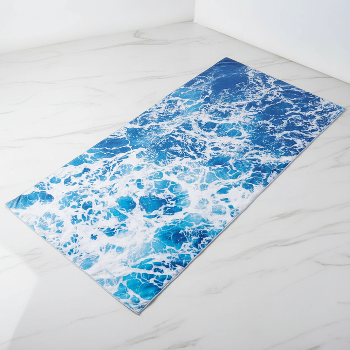 Lightweight absorbent microfiber beach towel in blue, ideal for travel & outdoor