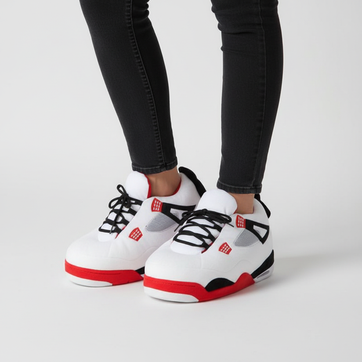 Close-up of the plush texture of a gray oversized sneaker slipper, ultimate comfort