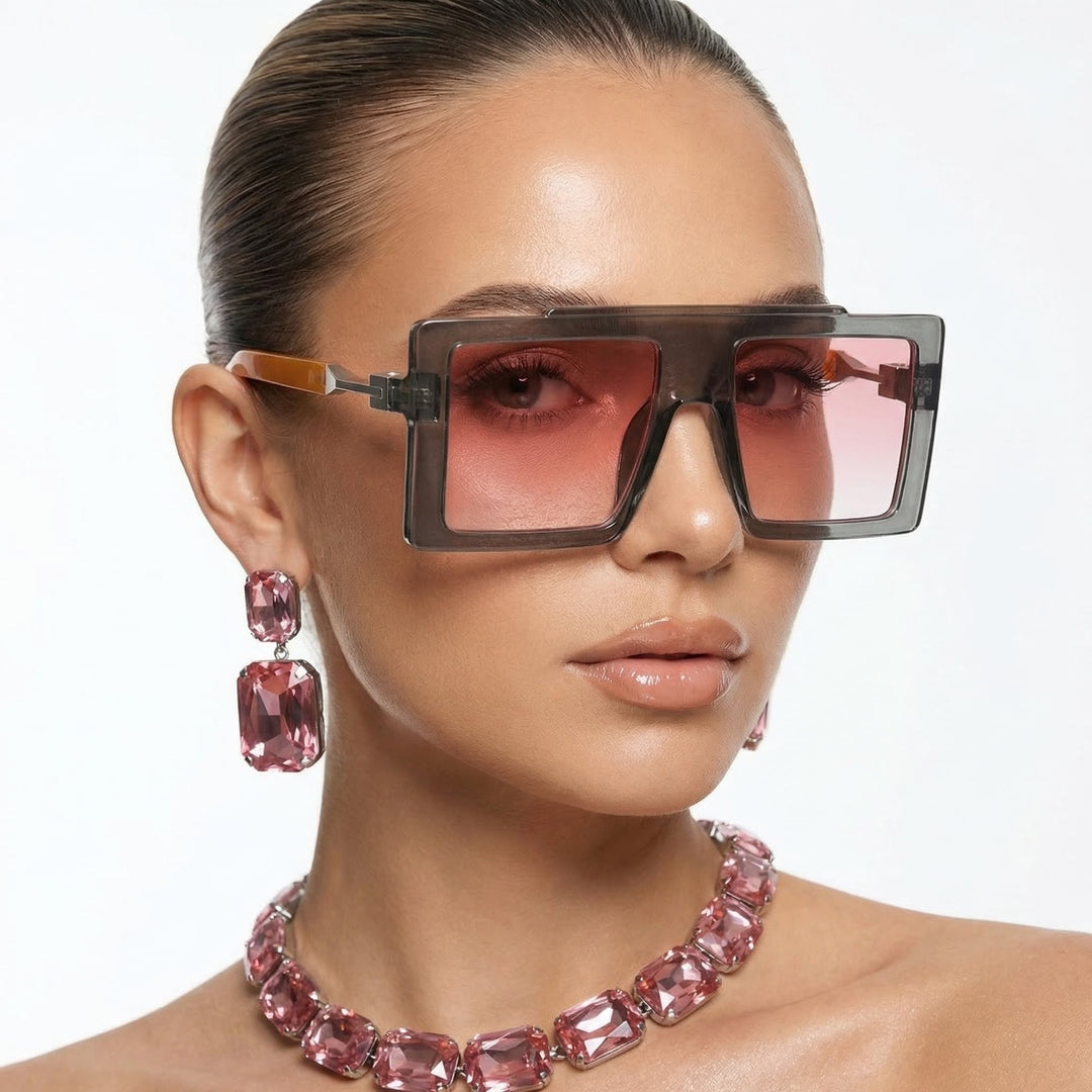 Unisex oversized square sunglasses with UV400 protection. Modern fashion eyewear for a bold statement.
