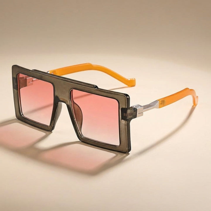 Bold oversized square frame sunglasses with UV400 protection. Unisex fashion shades for a stylish, modern look.