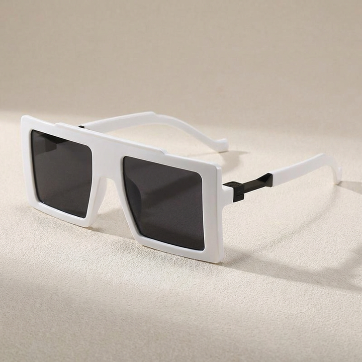 Unisex statement oversized square sunglasses. Fashion eyewear with UV400 protection for a contemporary style.