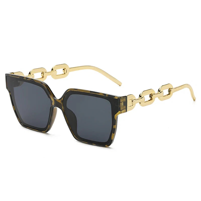 Unisex oversized sunglasses with 100% UV400 protection, stylish chain temples, perfect for a modern and chic eyewear look.