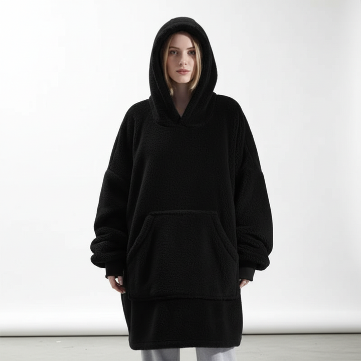 Unisex Oversized Warm Flannel Blanket Hoodie folded neatly, showcasing its soft flannel texture