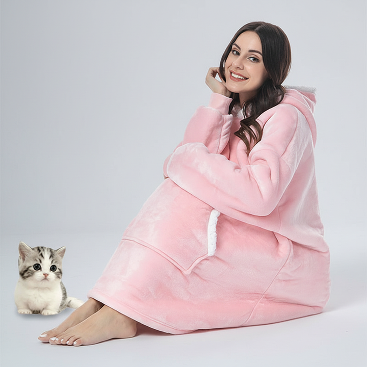 Unisex wearable blanket hoodie draped over a chair, inviting comfort and relaxation