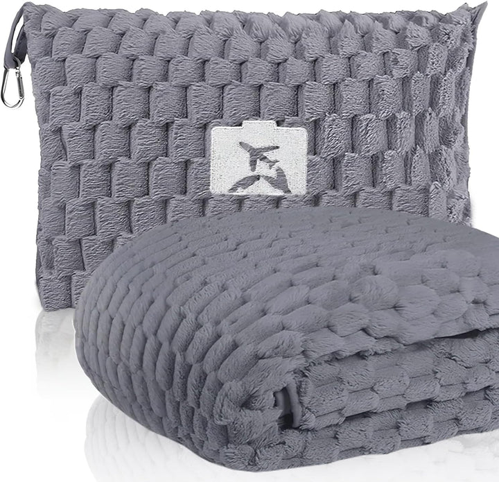 Detail of the durable stitching and quality material of the Trevora travel blanket