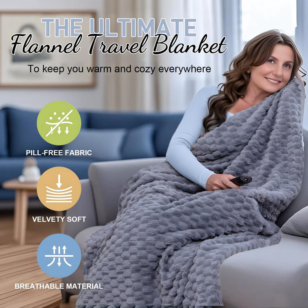 Trevora packable flannel travel blanket folded neatly into its carrying bag, side view