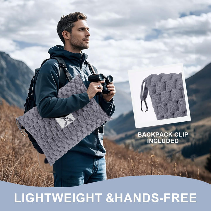 Versatile gray flannel travel blanket with pillow, perfect for camping and outdoor adventures