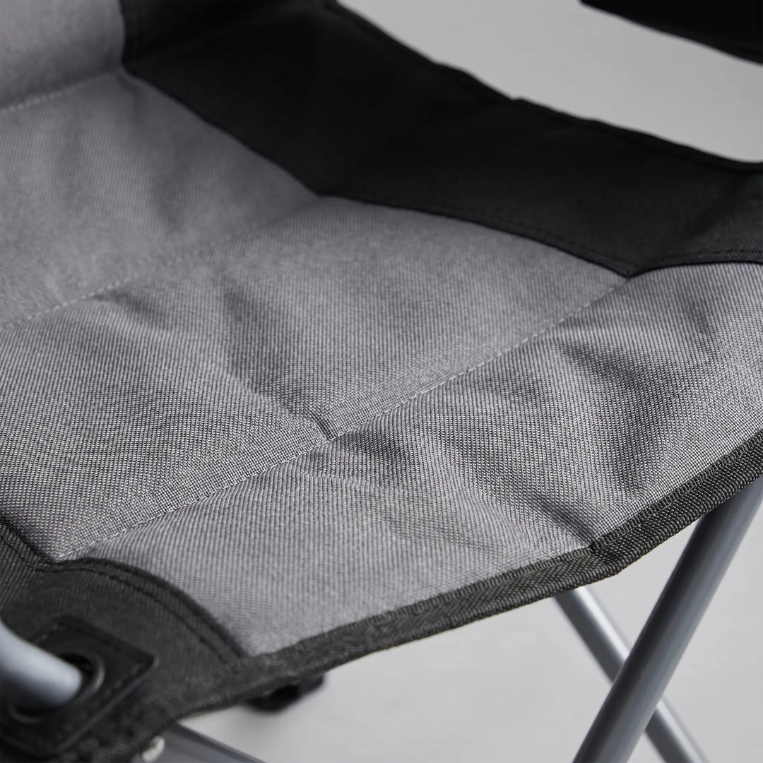 Comfortable X-brace supported padded folding chair. Perfect outdoor seating for camping, fishing, and backyard relaxation.