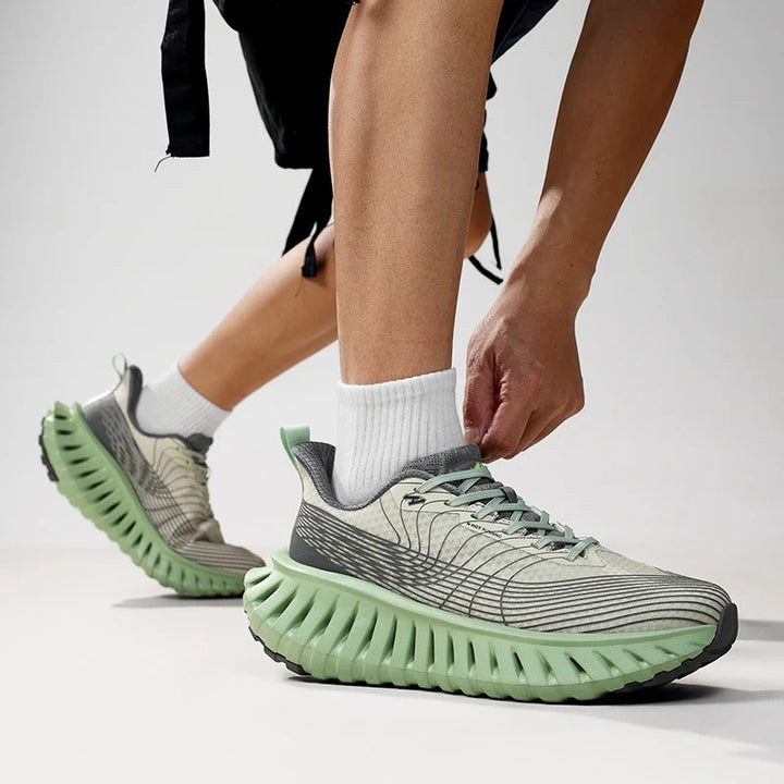 Side view of supportive unisex running sneakers, featuring breathable mesh and responsive cushioning for comfort.