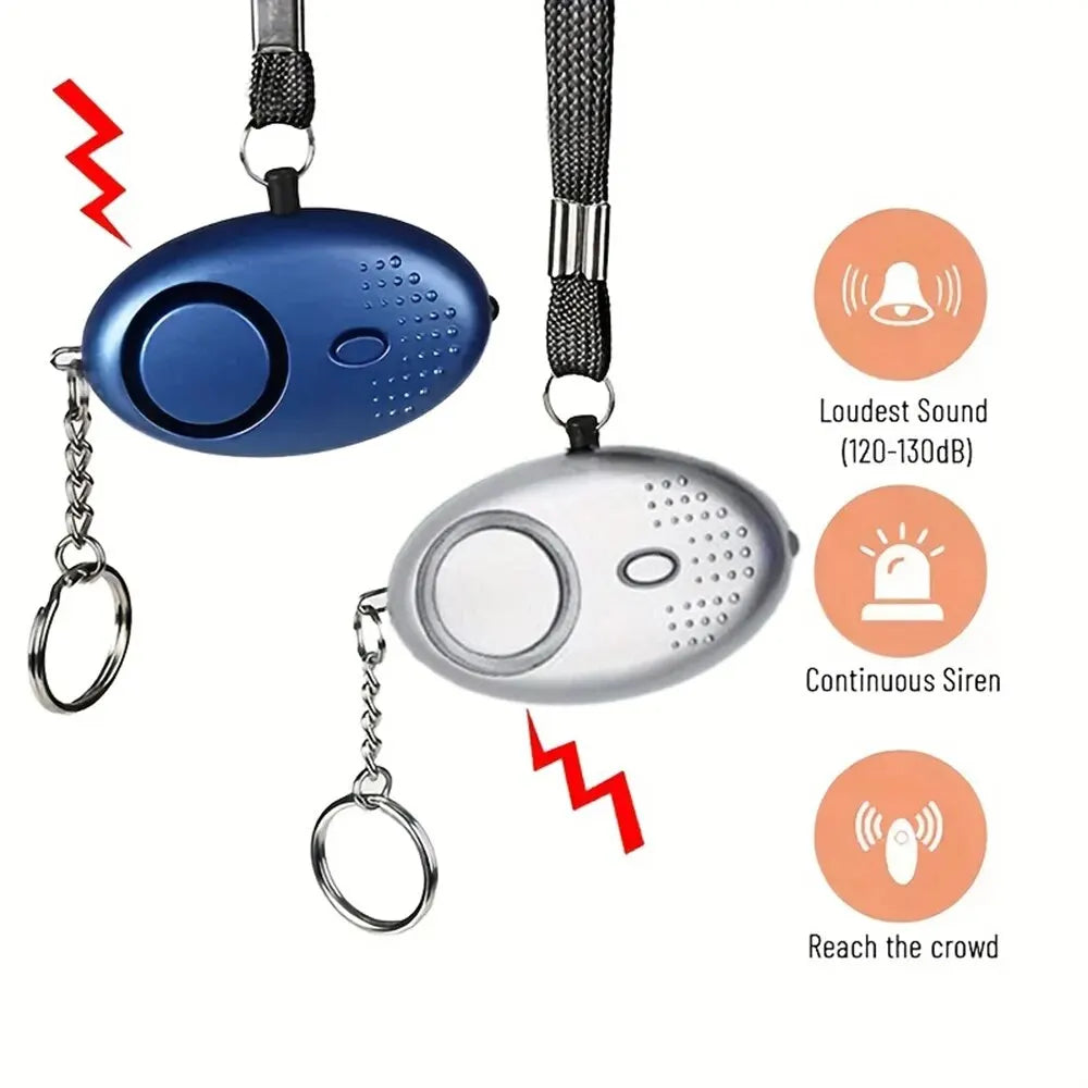 Portable keychain safety alarm, 130 dB loud siren & bright LED light for personal protection and security.