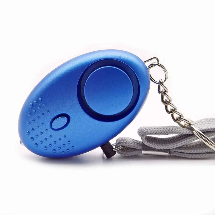 Bright red 130 dB personal safety alarm with LED light, essential for enhancing personal security.