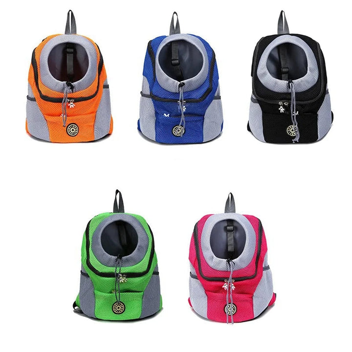 Medium pet carrier backpack worn by traveler, perfect for hands-free outdoor adventures with cats or small dogs.