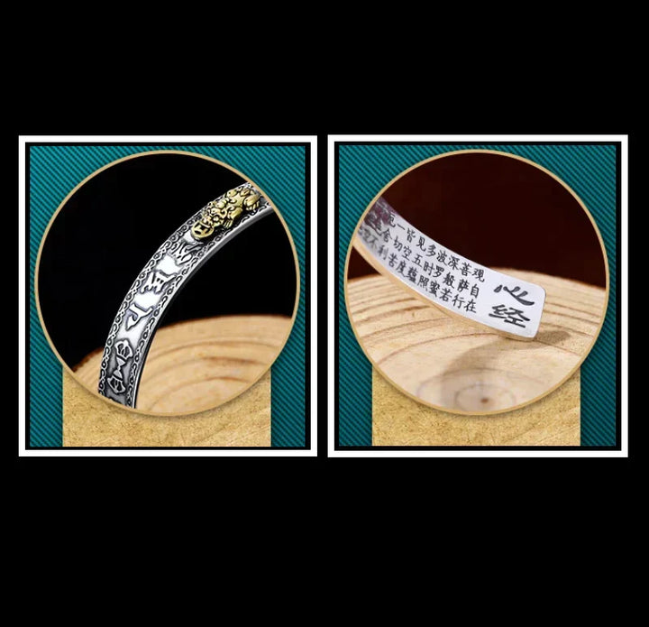 Stylish unisex Pixiu bracelet with gold & black beads, an adjustable spiritual accessory for wealth & prosperity.