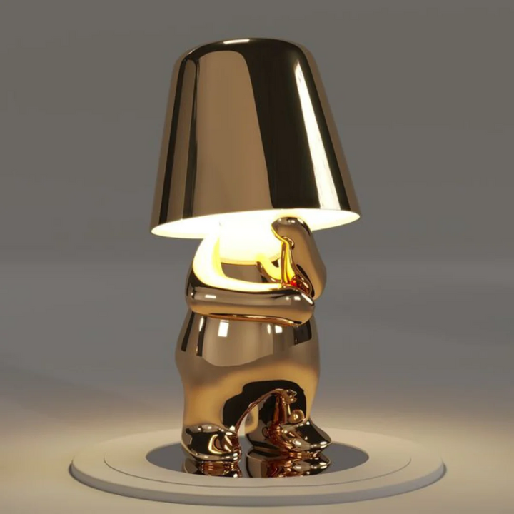 Rechargeable Playful Dimmable Table Lamp on office desk, portable LED light, modern decor