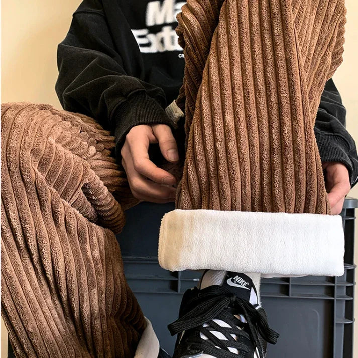 Beige unisex wide leg sweatpants with drawstring, ideal for comfortable lounging & casual style.