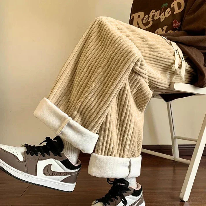 Brown unisex wide leg sweatpants, offering plush comfort and a relaxed fit for ultimate loungewear.