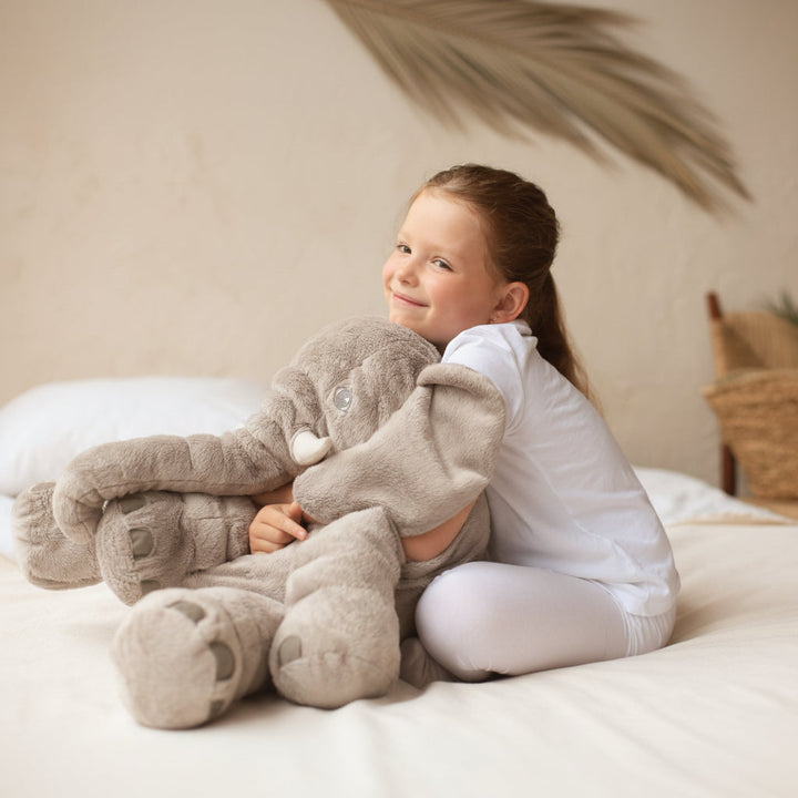 Unisex elephant plush pillow for cuddles, play, and nursery decor. A soft stuffed animal & comfort pillow.