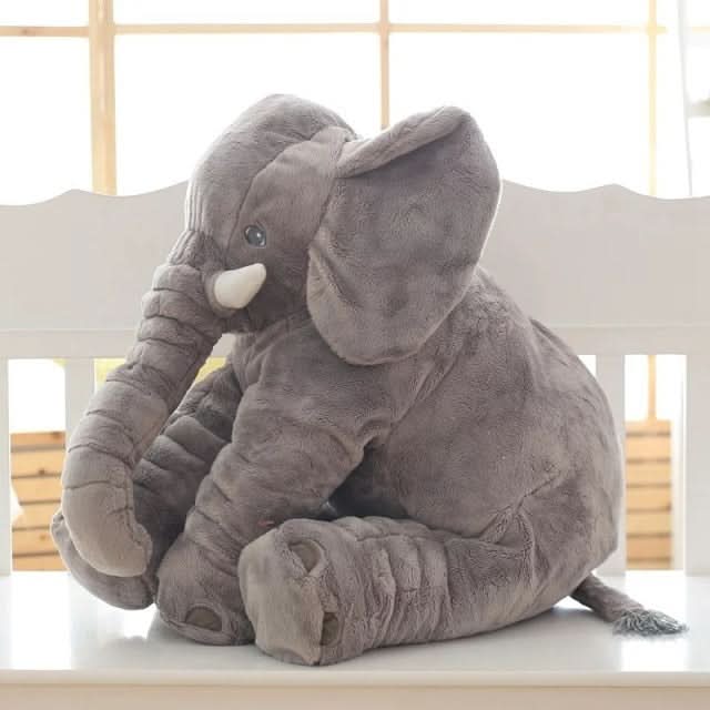Plush elephant cuddle pillow, a gentle stuffed animal perfect for baby gifts, kids' rooms, & nursery decor.