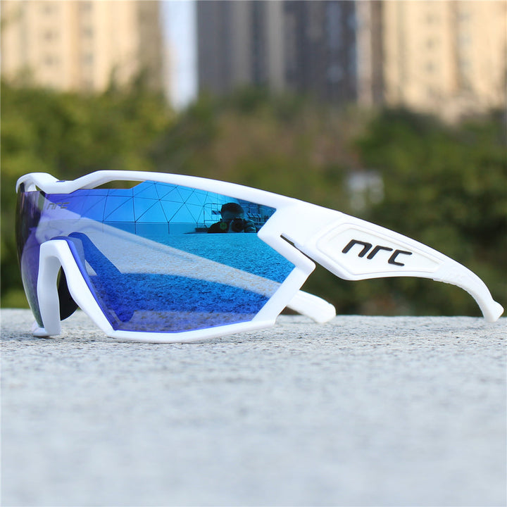 Durable unisex sport sunglasses with polarized lenses, essential anti-glare & UV protection for all outdoor sports.