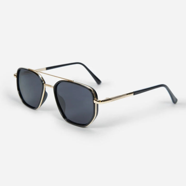 Person wearing unisex polarized sunglasses, enjoying outdoor activity with clear, glare-free vision.