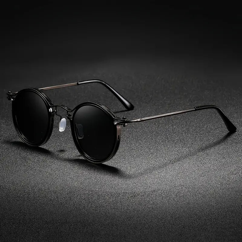 Gunmetal unisex polarized sunglasses for glare-free vision. Metal frame, UV protection, anti-reflective outdoor eyewear.