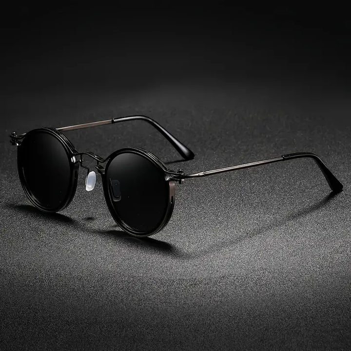 Gunmetal unisex polarized sunglasses for glare-free vision. Metal frame, UV protection, anti-reflective outdoor eyewear.