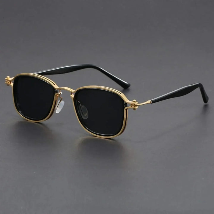 Unisex polarized sunglasses with stylish gold metal frame & black lenses. Offers UV protection & anti-glare.