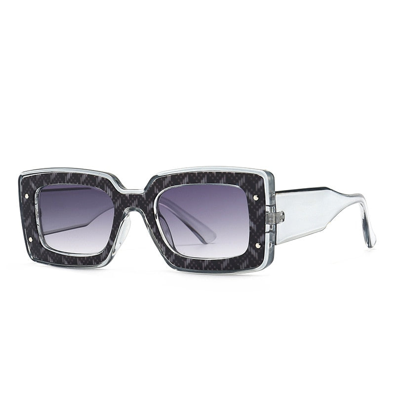 Fashionable unisex sunglasses with polarized lenses, offering UV400 protection. Perfect eyewear for any style.