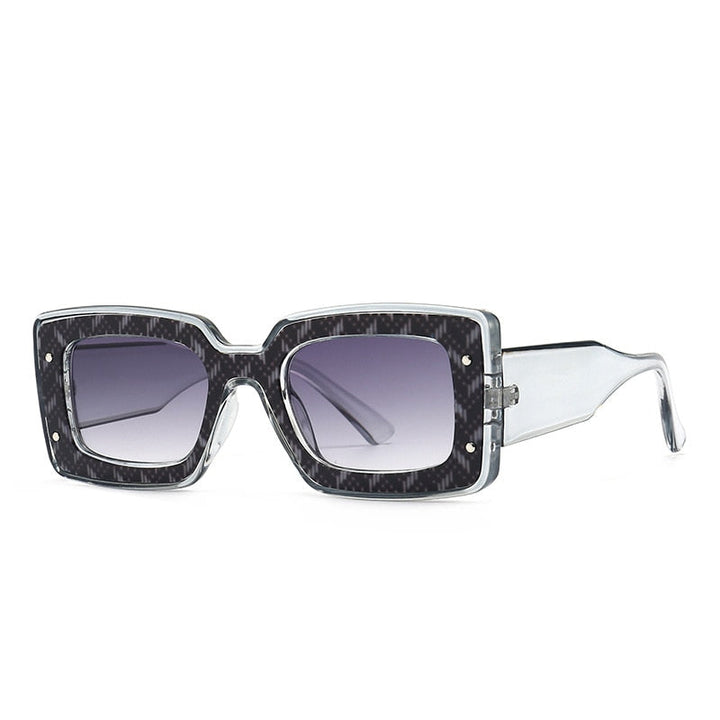 Fashionable unisex sunglasses with polarized lenses, offering UV400 protection. Perfect eyewear for any style.
