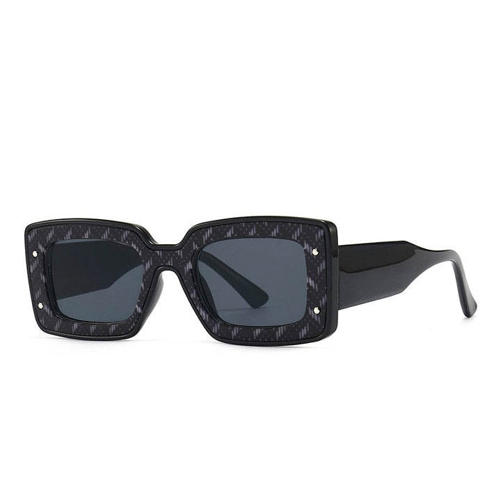 Stylish unisex accessory: polarized sunglasses with UV400 protection. Ideal for fashion and glare-free comfort.