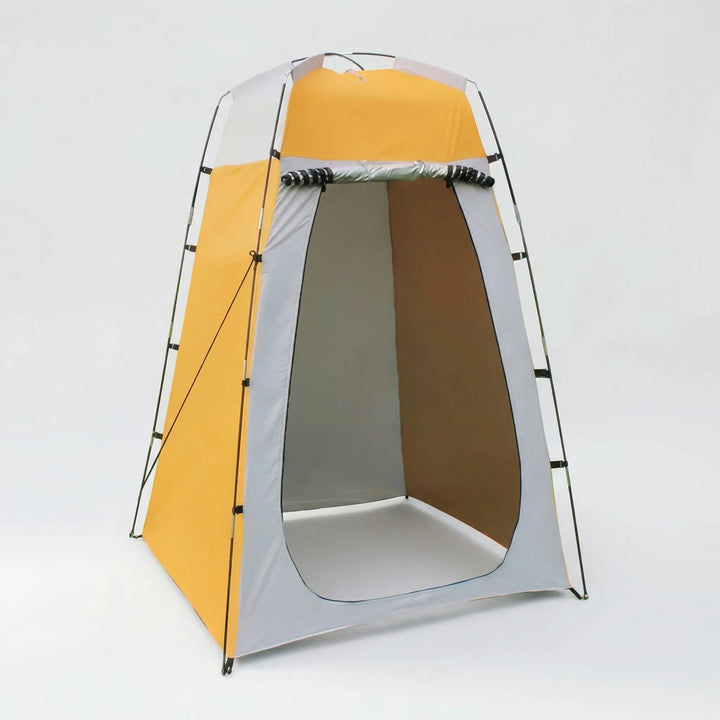 Compact pop-up privacy tent for outdoor changing, shower, or toilet. Portable camping shelter.