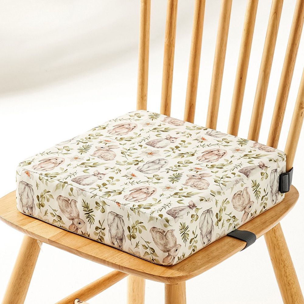 Adjustable portable high chair booster for secure baby dining & kids meals.