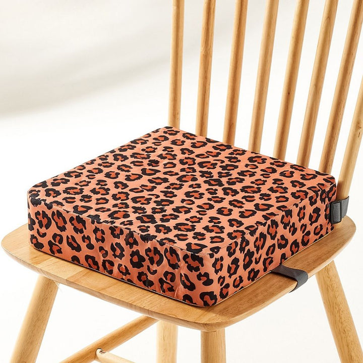 Compact travel booster seat, perfect for on-the-go baby feeding & child meals.