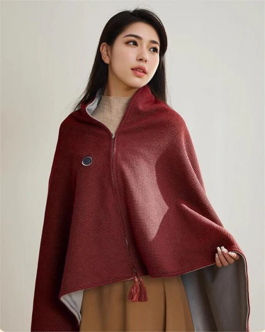 Unisex portable heated fleece shawl blanket for comfort and warmth at home or travel.