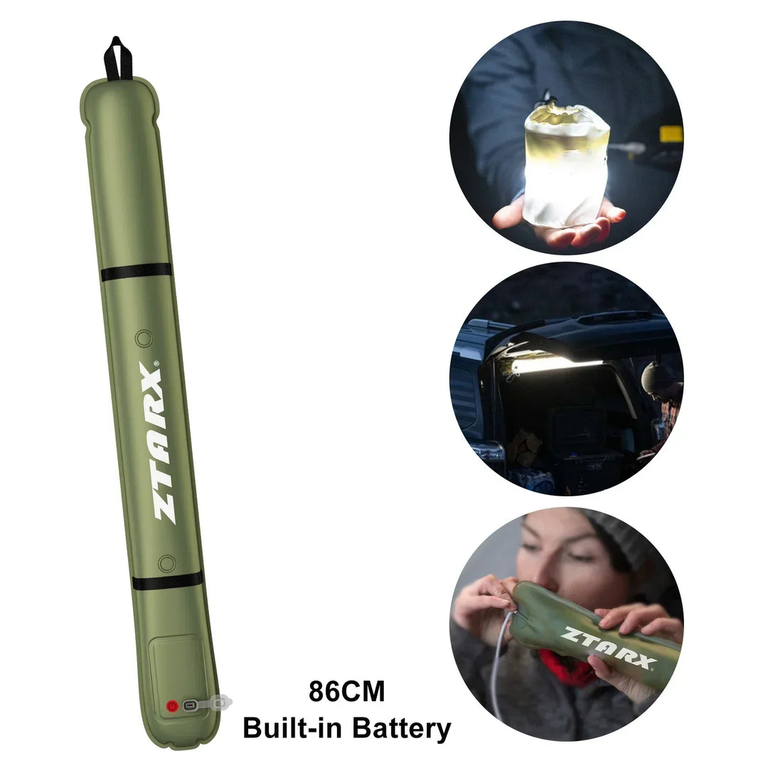 Hand holding a portable inflatable solar LED tube light, ready for camping or outdoor illumination.