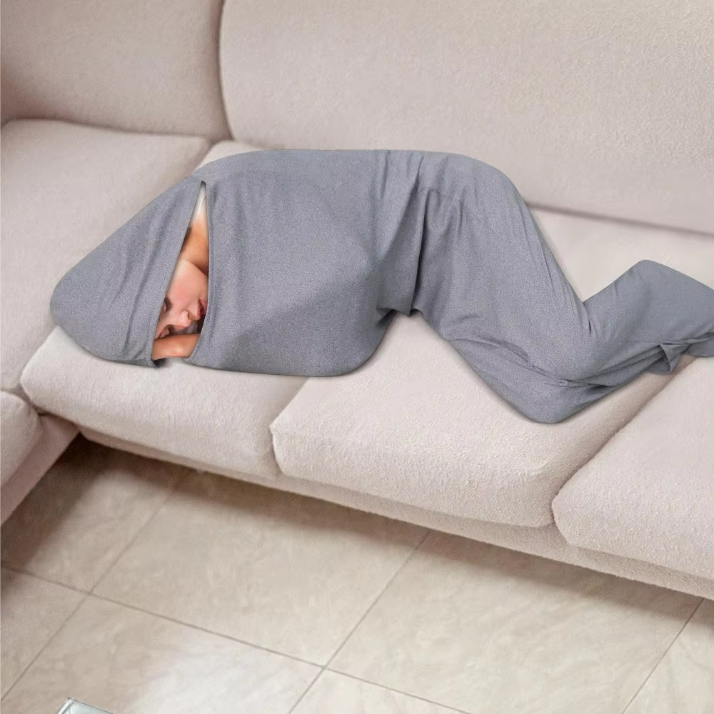 Unisex portable sleeping bag & travel compression blanket, great for outdoor travel, camping gear, and compact sleep.