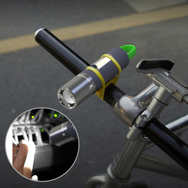 Zoomable LED flashlight beam adjusting from wide flood to narrow spot light.