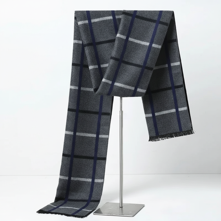 Close-up of a charcoal cashmere-feel winter scarf, showcasing its soft texture and quality.