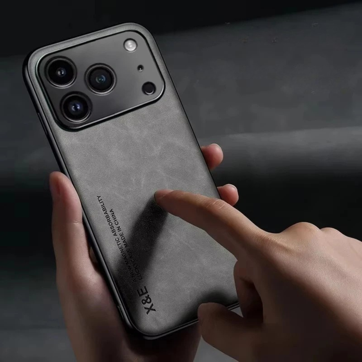 Slim protective suede iPhone case with magnetic closure. Ensures secure fit & luxurious feel for daily use.